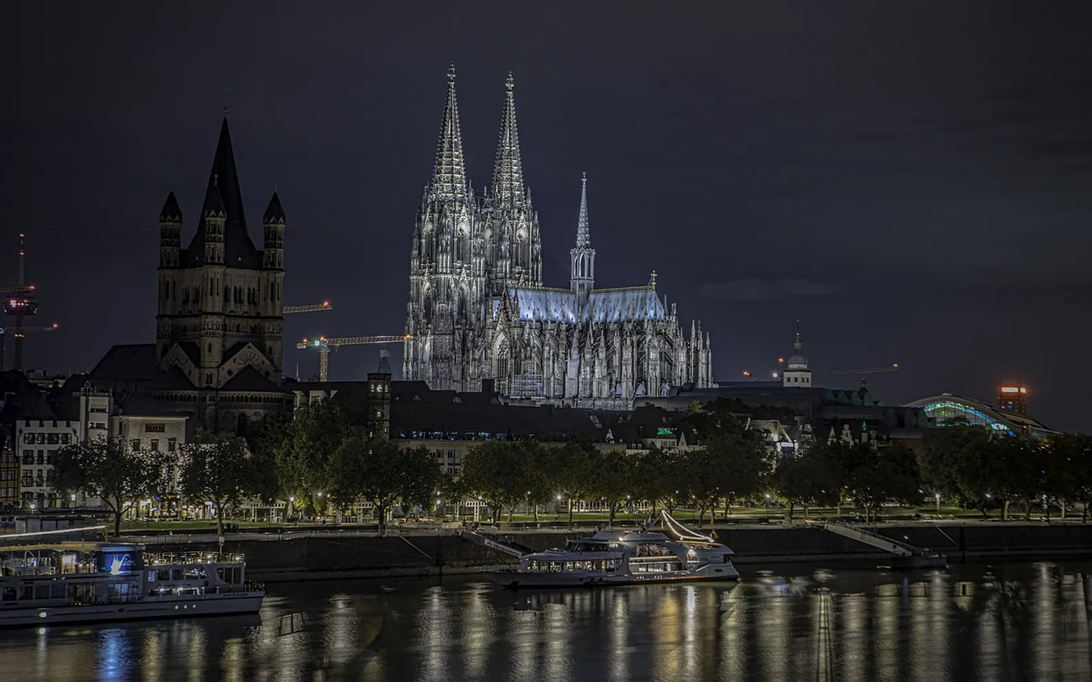 Cologne cathedral, night time and rhine river